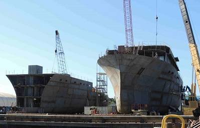 AGOR 27 R/V Neil Armstrong and AGOR 28 R/V Sally Ride (left) under construction at Dakota Creek Industries (DCI) in Anacortes, Wash.