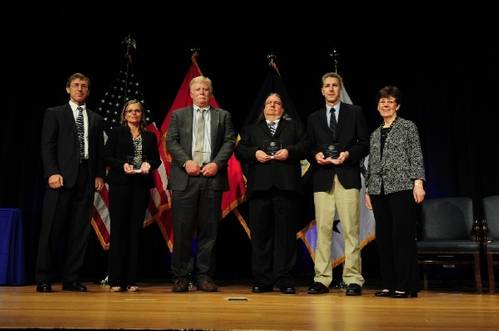 Assistant Secretary of the Navy (Research, Development & Acquisition) Sean Stackley (left), and Dr. Delores Etter (right) present the award to Ms. Pamela Posey, Dr. James Cummings, Dr. Alan Wallcraft, Mr. Joseph Metzger (left to right), NRL Oceanography Division. (Photo: U.S. Naval Research Laboratory)