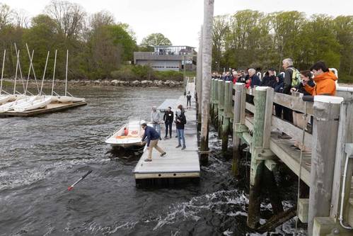JAIA Bot being thrown into the water.  Image courtesy Blue Venture Forum/Maggie Merrill