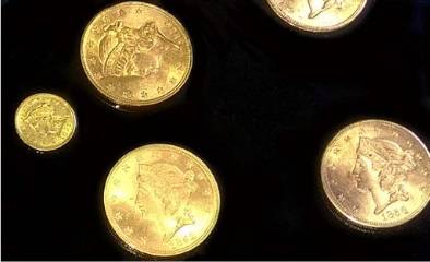 Coins recovered from the shipwreck of SS Central America (Photo: Odyssey Marine Exploration)