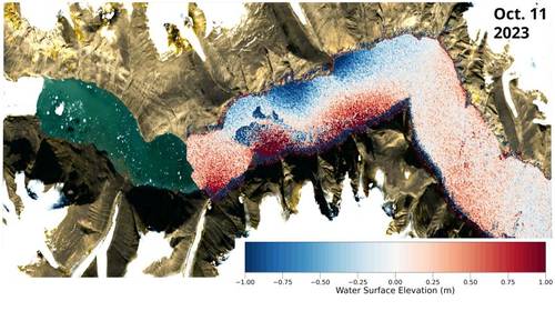 Copernicus Sentinel-2 satellite image of the Dickson Fjord in East Greenland with the observed sea-surface height measurements from the SWOT satellite of the Earth-shaking wave on 11 October 2023 overlaid. Credit: Thomas Monahan.