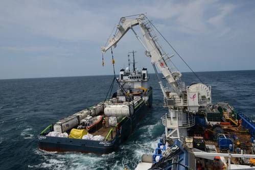 Crews aboard M/V SHELIA BORDELON offload more than 450,000 gallons of oil from the Coimbra shipwreck 30 miles offshore from Shinnecock, N.Y. U.S. Coast Guard responders discovered a significant amount of oil in cargo and fuel tanks during onsite assessments of the Coimbra in May 2019. (US Coast Guard photo by Michael Himes)