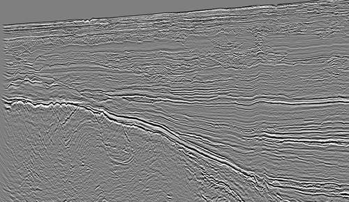 Early-out Fast-Track Pre-Stack Time Migration showing high-resolution detail of the thick Zambezi Basin sediments and previously unseen faulting geometry in the basement (image courtesy of CGG Multi-Client & New Ventures)