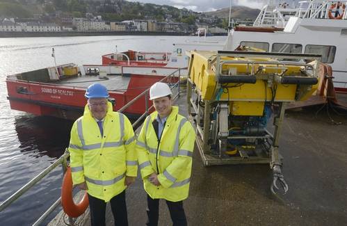 Energy Minister, Fergus Ewing (left), is pictured in front of one of The Underwater Centre’s new vessels and work-class ROV, with the Center’s General Manager, Steve Ham.