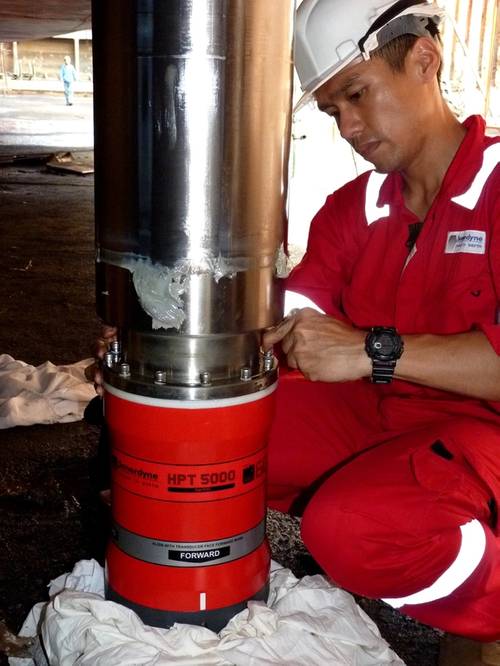 An engineer from Sonardyne Asia in Singapore completes the installation the SEAMEC Princess' new through-hull Ranger 2 acoustic transceiver