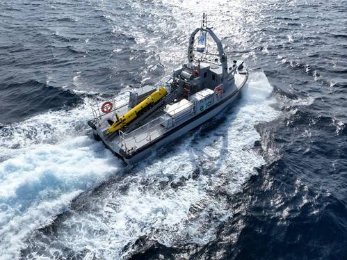 Exail has developed a modular LARS that can handle both AUVs and towed underwater vessels from an unmanned surface vessel. Credit: Exail