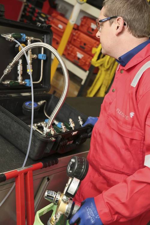 Flexlife technician examining annulus testing kit