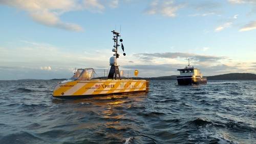 The GEBCO-NF Alumni team concept sets sail from Horten, Norway, on the first of three 24-hour sea-trials. The team observed the successful round of tests from a guard vessel, seen here behind USV-Maxlimer. (Photo: GEBCO)