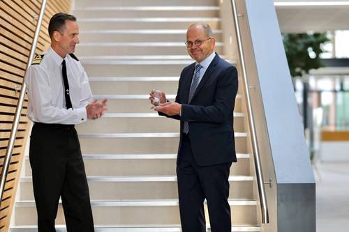 IC-ENC Chairman Marc van der Donck (right) receiving the 2022 Alexander Dalrymple Award from Rear Admiral Rhett Hatcher, UK National Hydrographer. Image courtesy UKHO