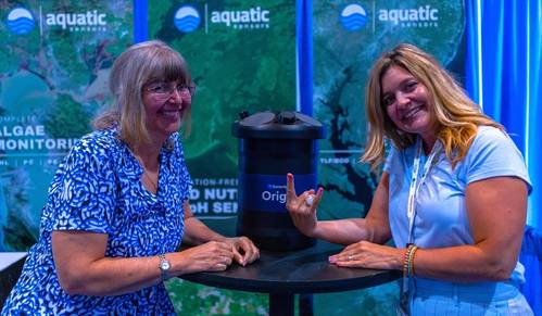 Image Caption: (L-R) Sonardyne Inc Sales Manager, Kim Swords and Aquatic Sensors Sales and Marketing Director, Andrea Zappe celebrate the news of the appointment at OCEANS 2023 in Biloxi. - Credit: Sonardyne