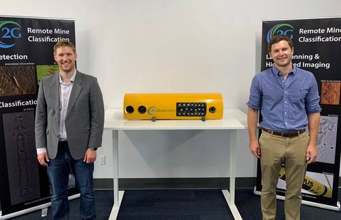 Jason Gillham (left) and Chris Gilson with one of 2G Robotic’s latest RECON line of payloads for light, modular AUVs.