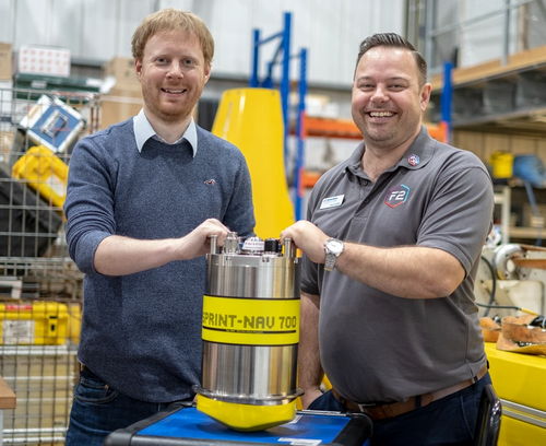 (L-R) Matt Kingsland, NOC and Paul Griffiths, Sonardyne, with the SPRINT-Nav 700 at the NOC robotics lab during Ocean Business (Photo: Sonardyne)