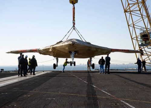 Loading Drone Aboard: Photo credit USN