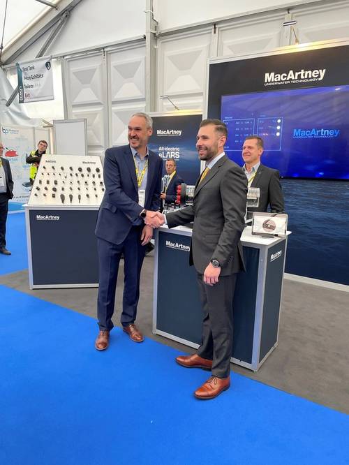 MacArtney’s Phil Middleton and STR’s Neil Jackson confirm the NEXUS 8 transaction at OB21. Photo courtesy MacArtney