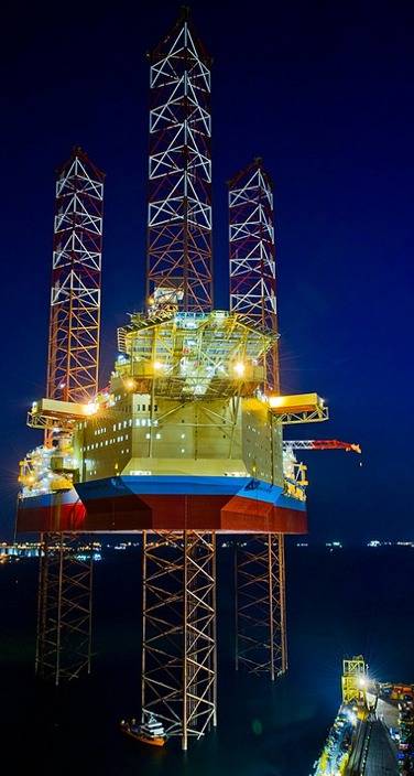 Maersk Intrepid at night: Image Maersk Drilling