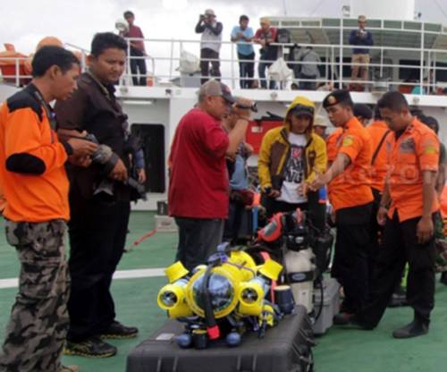 Members of Indonesia's national search and rescue agency Basarnas on board the search vessel preparing to deploy their JW Fishers ROV. (Photo courtesy of JW Fishers)