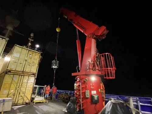 Night-time mooring deployment near Hanna Shoal in the Chukchi Sea. Photo credit: Seth Danielson, chief scientist