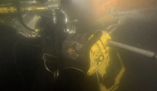 Phoenix Diver Using a Hole Saw to "Drill Stop" a Crack. © Phoenix International Holdings