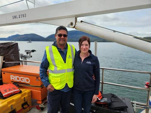 Pictured from left to right: Adrian Maharaj (Pioneer Consulting's shipboard representative) and Sarah Kathrein (CTC Project Manager) aboard the marine route survey vessel for the FISH West and FISH South submarine cable systems at the start of the survey in May 2025. © Cordova Telecom Cooperative, Inc.