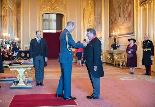 Professor Ed Hill receiving CBE insignia from HRH The Duke of Cambridge and Windsor Castle. (Photo: NOC)