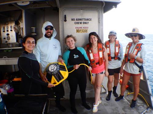Sanctuary staff holding Bob just before installation in June 2023. © Flower Garden Banks National Marine Sanctuary 