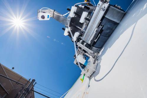 Sandia National Laboratories researchers use crawling robots and drones with infrared cameras to look for hidden wind blade damage to keep blades operational for longer and drive down the costs of wind energy. (Photo: Randy Montoya)
