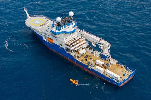 The science team recovers a glider after weeks of collecting data. During the expedition, two gliders provided continuous physical and biological data, including temperature, currents, dissolved oxygen, microstructure turbulence, and zooplankton presence. This process helped scientists select data-collection stations in near-real time. © Alex Ingle / Schmidt Ocean Institute