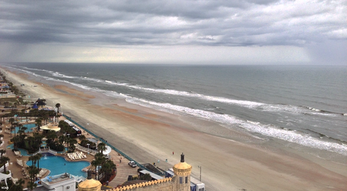 A storm rolls in over Daytona Beach, Fla. Accurate coastal and ocean data and information help resilient communities prepare for and mitigate hazards like beach erosion and coastal flooding, and to prevent loss of human life. (Image credit: NOAA)