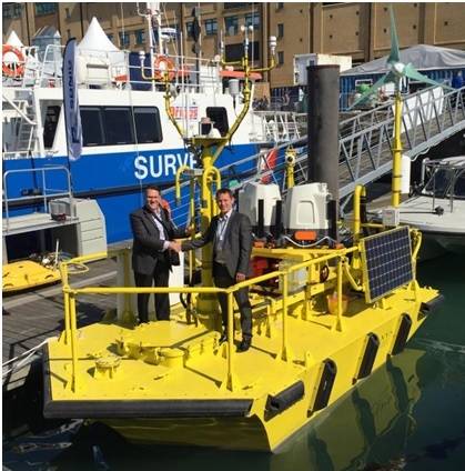 Terry Tarle, President & CEO of AXYS confirms deal with Ian Locker, MD of ZephIR LiDAR for the provision of dual ZephIR 300s on WindSentinel floating LiDAR buoy (Photo courtesy of AXYS Technologies Inc.)