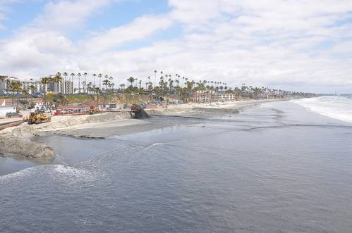 In this file photo, Manson Construction Company of Seattle conducts dredging operations in Oceanside Harbor, California. (Photo: Dena O' Dell / USACE)