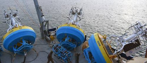 Three OOI Coastal Surface Moorings stand ready on deck as the R/V Neil Armstrong prepares for departure for a Pioneer Array deployment off the coast of New England. Each fully instrumented mooring weighs in at more than 8,000 pounds, making it necessary to carefully coordinate their movement on deck and deployment. Only one of these will be deployed in the Southern Mid-Atlantic Bight during the initial test deployment.
Credit: Rebecca Travis /© Woods Hole Oceanographic Institution
