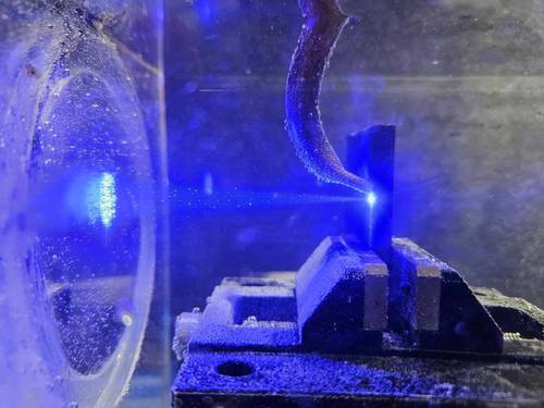 Underwater processing with blue diode laser – Perforation / Penetration through 8 mm steel plate © Laserline