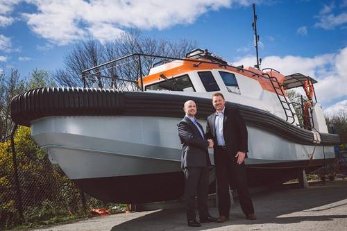 Unique Group's UK Managing Director, Ray Hughes, handing the Vaila over to Vertech's UK Managing Director, John Marsden (Photo: Unique Group)