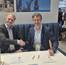Mark Heine, Fugro CEO, (left) and Auden Berg, EVP, Kongsberg Discovery, sign the agreement at Oceanology International. © Kongsberg Discovery

