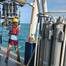 Scientists retrieve the CTD (conductivity, temperature, depth) sensor package after profiling dissolved oxygen at a station on the Shelfwide Hypoxia Cruise. (Image credit: Courtesy of Cassandra Glaspie/LSU)