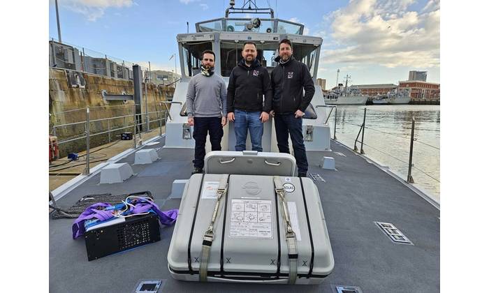 The Aquark team on board the HMS Pursuer. Credit: Aquark