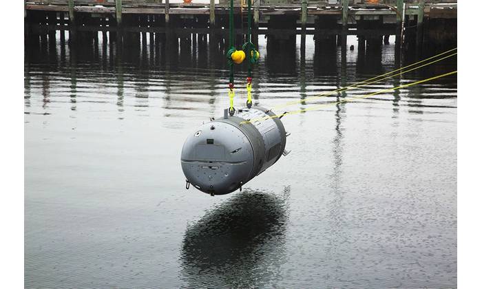 Deployable from the dry deck shelter of a submarine, Snakehead provides guidance and control, navigation, situational awareness, propulsion, maneuvering and sensors in support of the intelligence preparation of the operational environment mission. 
Credit: Richard Allen/US Navy/NUWCD Newport
