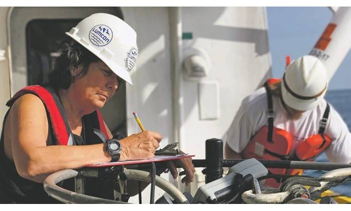 Nancy Rabalais records data during a cruise aboard the R/V Pelican in the Gulf of Mexico to study hypoxia. (Photo: LUMCON)
