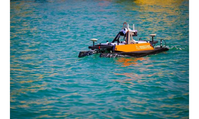U.S. Naval Oceanographic Office conducts a hydrographic survey by launching an unmanned surface vessel, supported by a Bahrain Coast Guard escort, in the U.S. Central Command area of responsibility. Credit: Official U.S. Navy photo