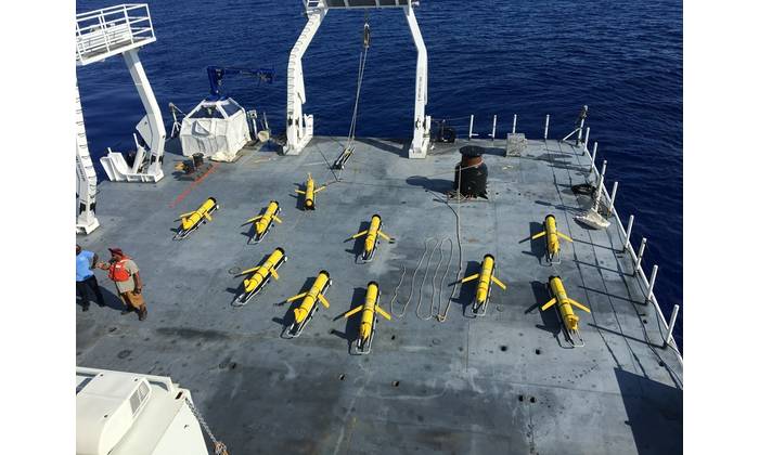 Naval Oceanographic Office personnel prepare to launch 10 littoral battlespace sensing gliders from USNS Maury in the Eastern Atlantic Ocean in support of NAVOCEANO's goal to deploy more than 50 gliders globally. These gliders are unmanned underwater vehicles used to collect data that is incorporated into ocean models, ultimately providing underwater forecasts for U.S. Navy operations. (Credit: Rebecca Shaw, Naval Oceanographic Office)