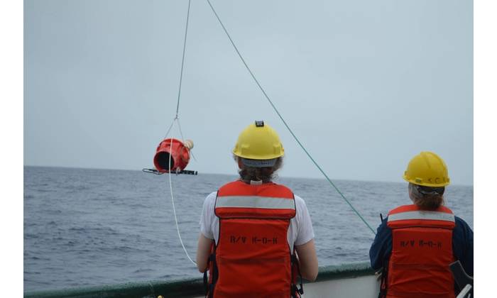 NOAA Affiliates Dr. Elizabeth Steffen (left) and Marine Tech Elizabeth Ricci (right) deploy a Deep Sounding Oceanographic Lagrangian Observer (SOLO) Argo float from the R/V Kaʻimikai-O-Kanaloa in 2018. The Deep SOLO float was developed by the Scripps Institute of Oceanography Instrument Development Group (SIO IDG), and this was the first Deep SOLO float to be deployed by NOAA Affiliates. Credit: NOAA