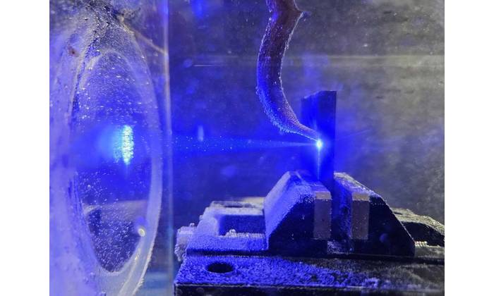 Underwater processing with blue diode laser – Perforation / Penetration through 8 mm steel plate © Laserline