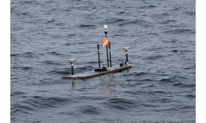 The USGS Wave Glider on mission equipped with Sonardyne GNSS-A instrumentation. Credit: USGS