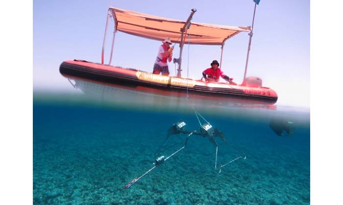 Vessels fitted with a swinging davit arm and winch are ideal for deploying and retrieving Baited Remote Undersea Video (BRUV) systems. In this photo, a Stereo-BRUV system, developed by the Australian Institute of Marine Science (AIMS), is lowered to the seafloor. BRUVs have minimal impact on seafloor communities or the seabed. Photo by Marine Ecology Group - Fish Research, The University of Western Australia