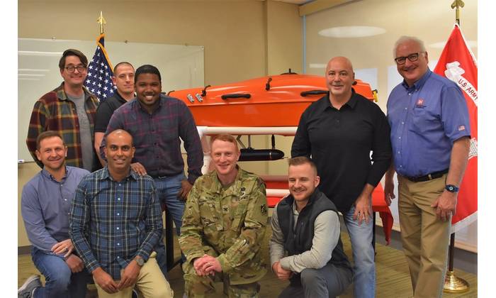 New York District Survey and Mapping Branch employees with New York District Commander Col. Alexander Young and SURVEYOR AMY, an award-winning USV. Left to right, kneeling: John Mraz, Pradeep Bhadur, Col. Young and Joshua Sagona; left to right, standing: Bryan Higgins, Christopher Aballo, Miguel Surage, Survey and Mapping Branch Chief Francis Postiglione and Operations Division Chief Randall Hintz. (Photo: USACE)