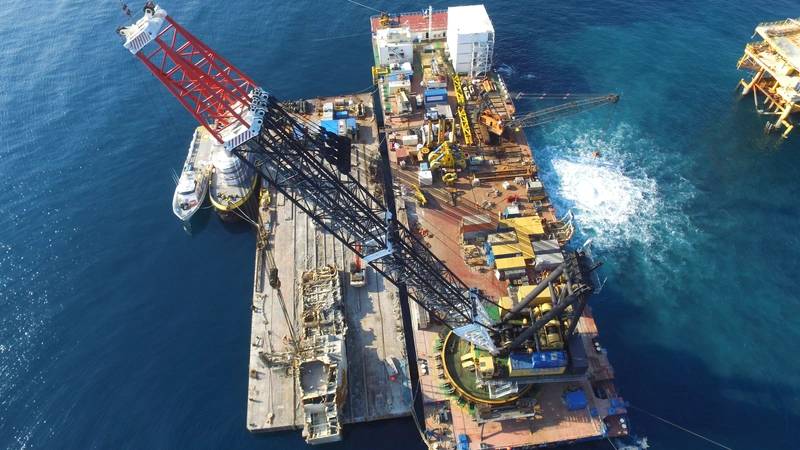 Ardent completed removing the Troll Solution jack-up in November, 2016. Ardent deployed assets from several countries, including the crane barge Conquest MB-1, and a 1,000-ton hydraulic wreck grab from the Netherlands. Further support vessels were deployed from the U.S. and Mexico. (Photo: Ardent)
