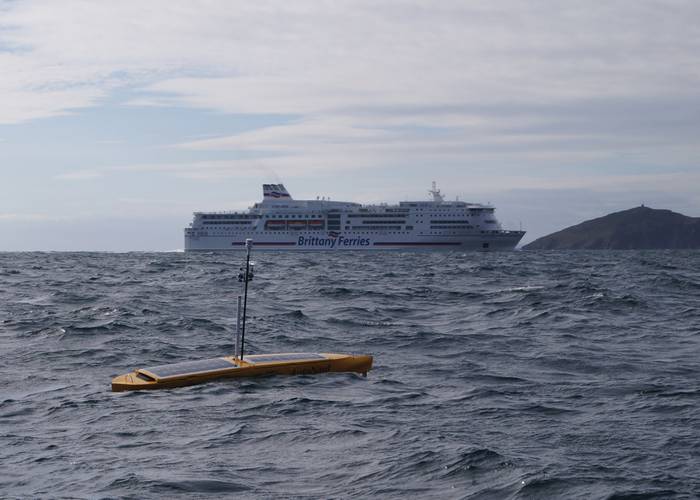 3.5m AutoNaut and Plymouth Ferry. AutoNaut can be controlled using local UHF or WiFi comms, or an Iridium Satellite link. 