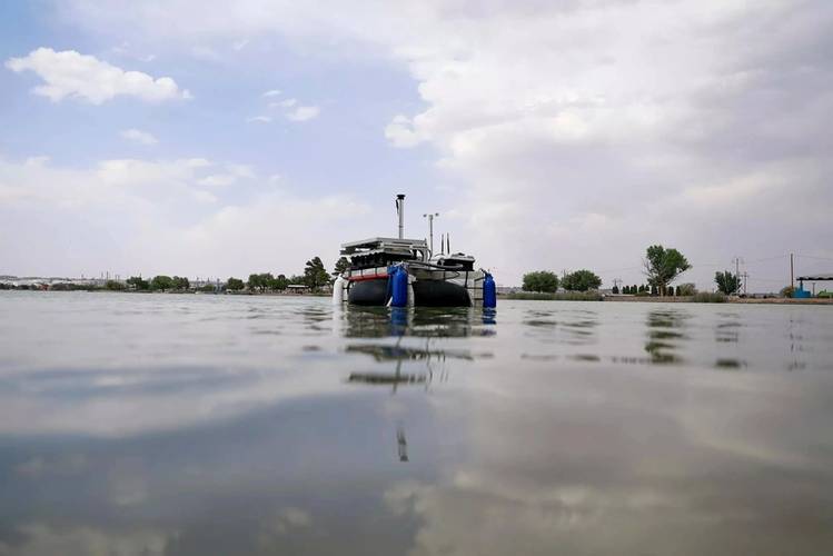 An autonomous boat made by researchers at The
University of Texas at El Paso floats at Ascarate Lake, located in El Paso, Texas. Credit: The University of
Texas at El Paso.