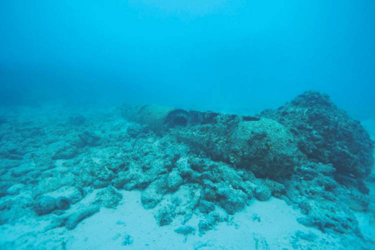 What began as a typical grounding response quickly turned into anything but when the initial dive survey turned up a World War II era torpedo and unexploded mines around the vessel.  