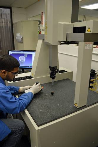 A BIRNS technician inspects an insert with the DCC CMM (Photo: BIRNS)
